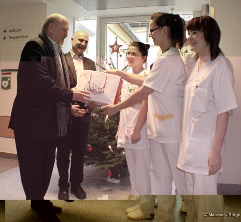 Bild zu Oberbrgermeister Deinege zu Weihnachten im St. Carolus